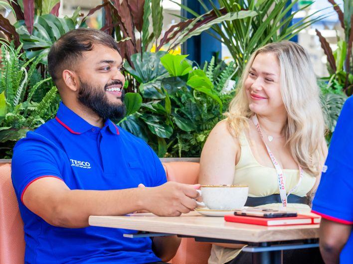 Store colleagues talking in the cafe